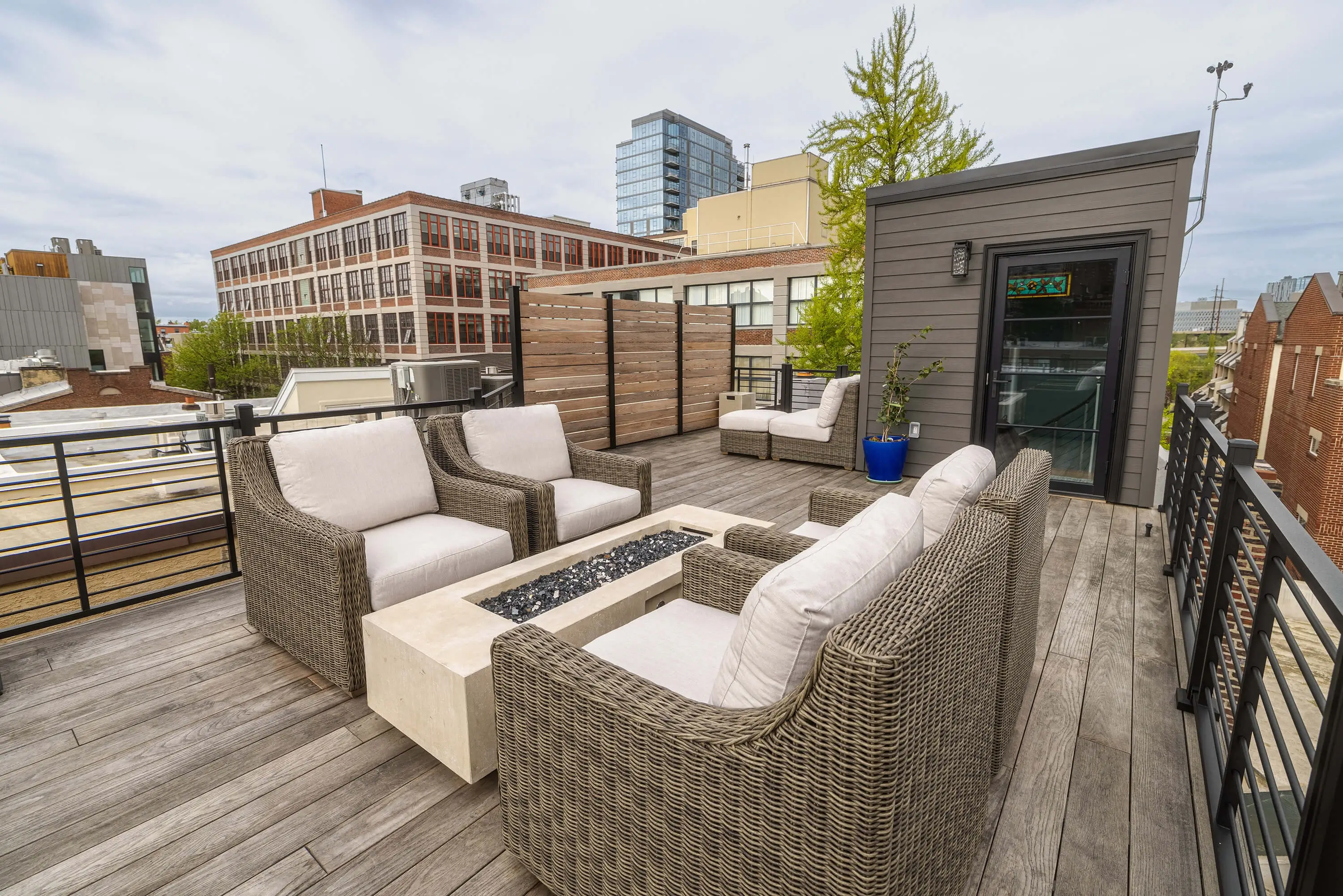Match Remodeling urban outdoor living space featuring Americana wood